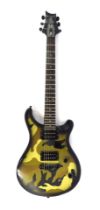 A PRS SE Standard electric guitar, with camouflage style body, 92cm long, in canvas case.