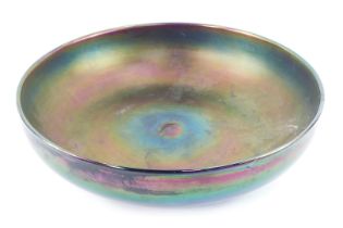 A 20thC lustre glass fruit bowl, purple ground with iridescent blue and green, unsigned, 34cm diamet