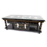 A reproduction Chinese black lacquer coffee table, with fall top, enclosed with mother of pearl inla