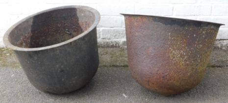 Two cast iron planters, of circular form.