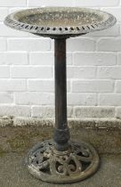 A cast metal bird bath, 70cm high.