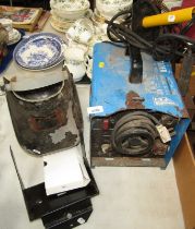 A Cebora welding machine, together with a mask, and various other related equipment.