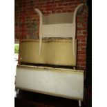 Two Lloyd Loom style blanket chests, together with a tub chair. (3) The upholstery in this lot does