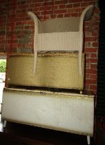 Two Lloyd Loom style blanket chests, together with a tub chair. (3) The upholstery in this lot does