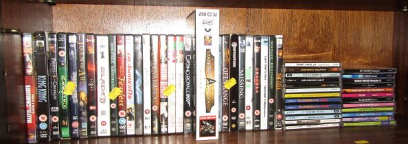 DVDs and CDs, to include Open Range, Star Fleet Command, Die Another Day, Nemesis and others. (1 she