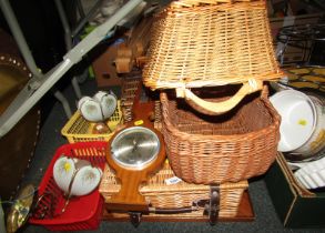 Two wicker picnic baskets, wooden chess board, two wicker carrying baskets, hanging wall barometer,