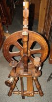 An oak spinning wheel.