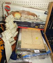 An Airfix model kit for HMS Hood, a built pond yacht, and various Model Ship De Agostini boat magazi