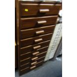 A Partridge and Cooper Ltd office cabinet, with nine drawers, 120cm high, 48cm wide, 46cm deep.