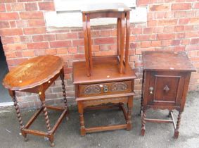 A group of furniture, to include nest of two tables, oak pot cupboard, oak side table, with carved d