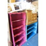 A group of furniture to include a pink painted open bookcase, two painted French style bedside table