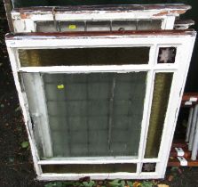 Five leaded and stained glass sash window panels, with painted surrounds.