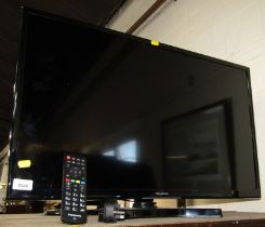 A Panasonic 32" flat screen television, with remote control.