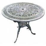 A Coalbrookedale style cast white painted garden table, with pierced circular top on tripod base, 70