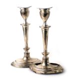 A pair of Edward VII silver candlesticks, each of boat shaped form, with weighted bases, Birmingham