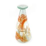 A Clutha style glass vase, with white and red marbled decoration to the indented body, engraved to u