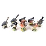 Eight Beswick birds, comprising grey wagtail, chaffinch, wren, stonechat, robin, two bullfinch, an g