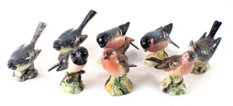 Eight Beswick birds, comprising grey wagtail, chaffinch, wren, stonechat, robin, two bullfinch, an g