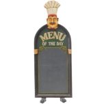 A painted restaurant blackboard, modelled in the form of a chef, 110cm high.