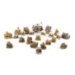 A quantity of Lilliput Lane cottages, to include Christmas Cake, Railway Cottage, etc.