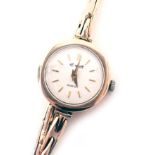 A 9ct gold cased Ingersoll ladies wristwatch, with a white enamel dial, on expanding bracelet, 2cm d