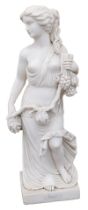 A carved marble statue of a neoclassical maiden, holding grapes, wreath etc. on square base, 120cm h