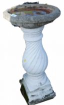 A reconstituted stone and painted white bird bath, on twist stem pedestal and square foot, 80cm high