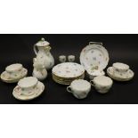 A late Meissen part tea service, etc., to include water or coffee pot and cover, side plates, cups,