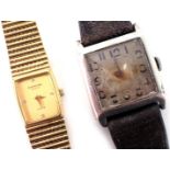 A Raymond Weil cocktail watch and a 1940s silver cased wristwatch, the square numeric silvered dial,