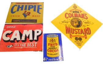 A collection of four reproduction enamel signs for Colman Mustard, Chippy overalls, Camp Coffee, and