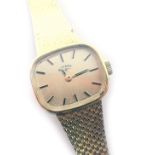 A 9ct gold Rotary lady's wristwatch, the rectangular silvered coloured dial, 2cm diameter, on a moul