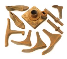 A quantity of cast iron shoe lasts, and a stand, etc.