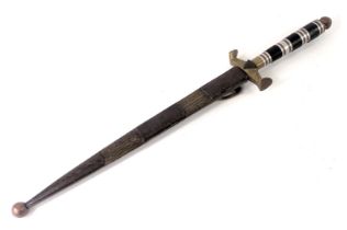A Continental brass dagger, with an engraved turned scabbard and horn handle, 43cm long.