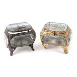 Two Taurus ware crystal jewellery caskets, one depicting a painted panel of the Eiffel Tower, etc.,