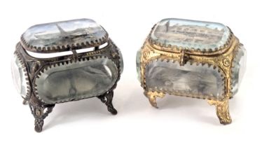 Two Taurus ware crystal jewellery caskets, one depicting a painted panel of the Eiffel Tower, etc.,