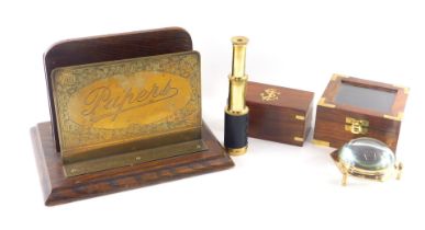 An oak and brass letter or stationary rack, engraved Papers, 26cm wide, an Indian brass telescope in