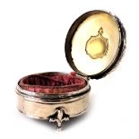 An Edward VII Selfridge & Co silver jewellery casket, of circular form, with a fluted outer border w