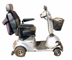 A Quingo Plus mobility scooter in silver and black, with charger, etc.
