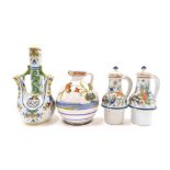 A collection of Faience items, to include a 19thC Faience jug decorated with flowers, a 19thC Fourma