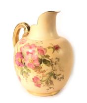 A Royal Worcester porcelain blush ivory ground ewer, decorated with pink and purple flowers and leav