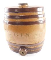 A 19thC brown stoneware ovoid spirit barrel, indistinctly painted in gilt Gin, 32cm high.