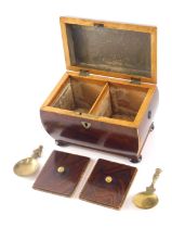 A Victorian rosewood and boxwood strung sarcophagus shaped tea caddy, the hinged lid enclosing two l