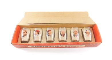 A set of six vintage 1960s Coronation Street glasses, each with printed image of character, in origi