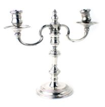 A George V silver two branch candelabra, with swag detail, London 1923, 22cm high, 15.10oz, partly l