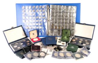 A group of collectors coins, comprising two 1983 Royal Mint Coin Set, commemorative crowns, three pa