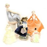 A collection of five porcelain figurines, to include Royal Doulton Flirtation, Lladro Coalport Grand