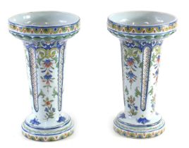 A pair of Fourmaintraux Faience vases, made at Courquin Desvres in Northern France, each decorated w