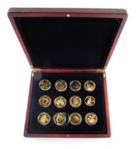 A collection of various Royal related gilt metal commemorative crown coins, from 1910 and 1911.