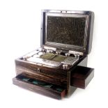 A Victorian Coromandel and brass inlaid dressing case, the hinged top with circular engraved cartouc