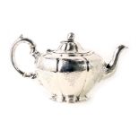 A Victorian silver teapot, with acorn finial, and engraved crosshatch and scroll pattern, with ivory